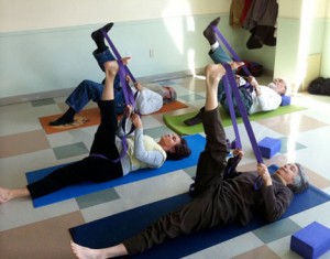 LWN yoga students do exercises