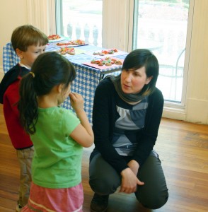 Jacy and children at art opening
